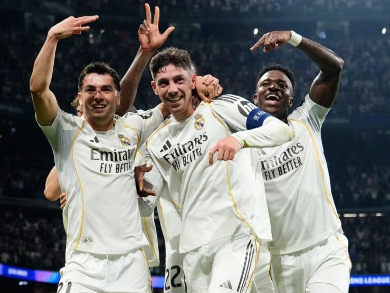 Federico Valverde celebrating his historic hat-trick against Manchester City with his teammates.